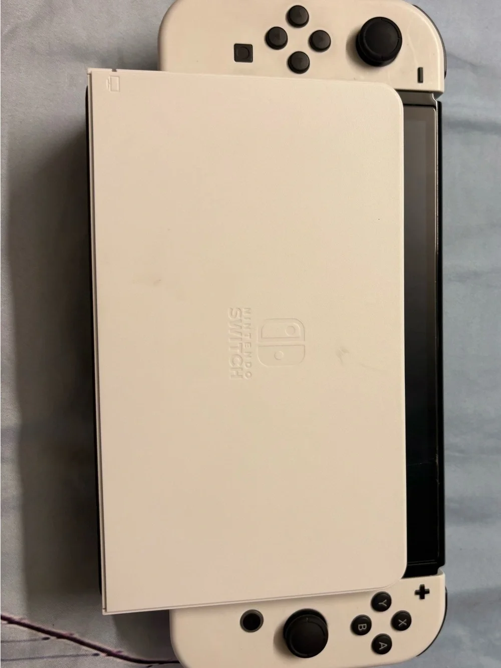 Nintendo Switch OLED Console with White Joy‑Con Controllers
